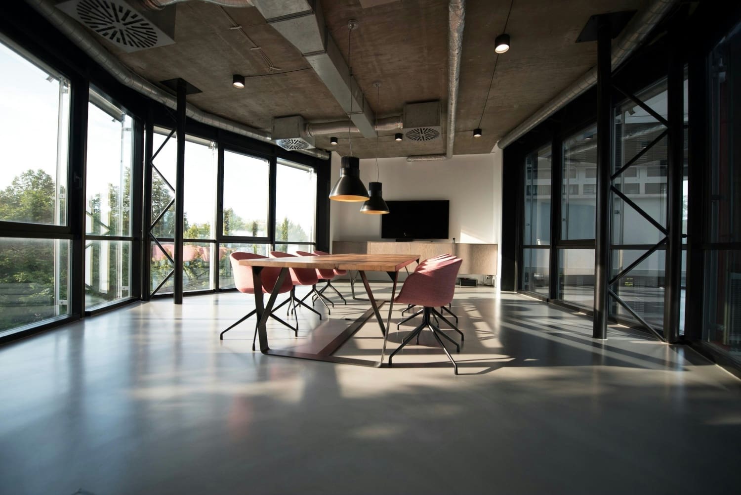 A room with chairs and tables in it